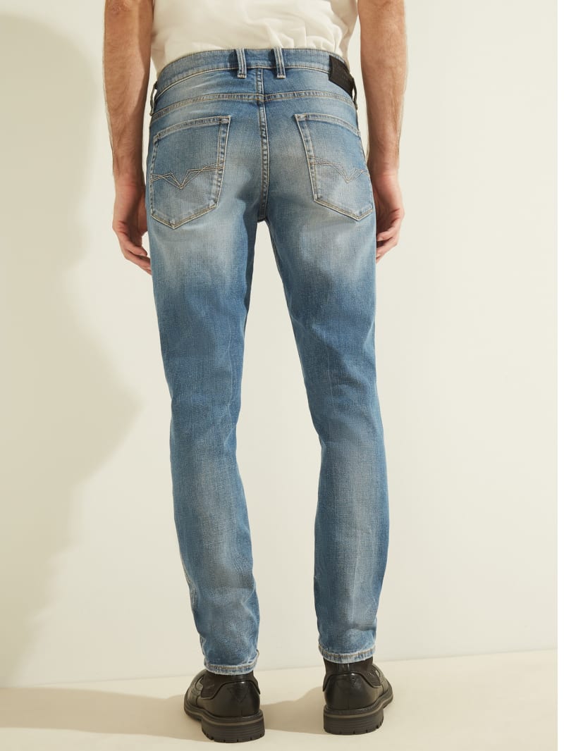 Blue Men's Guess Distressed Slim Tapered Pants | 1908253-SP