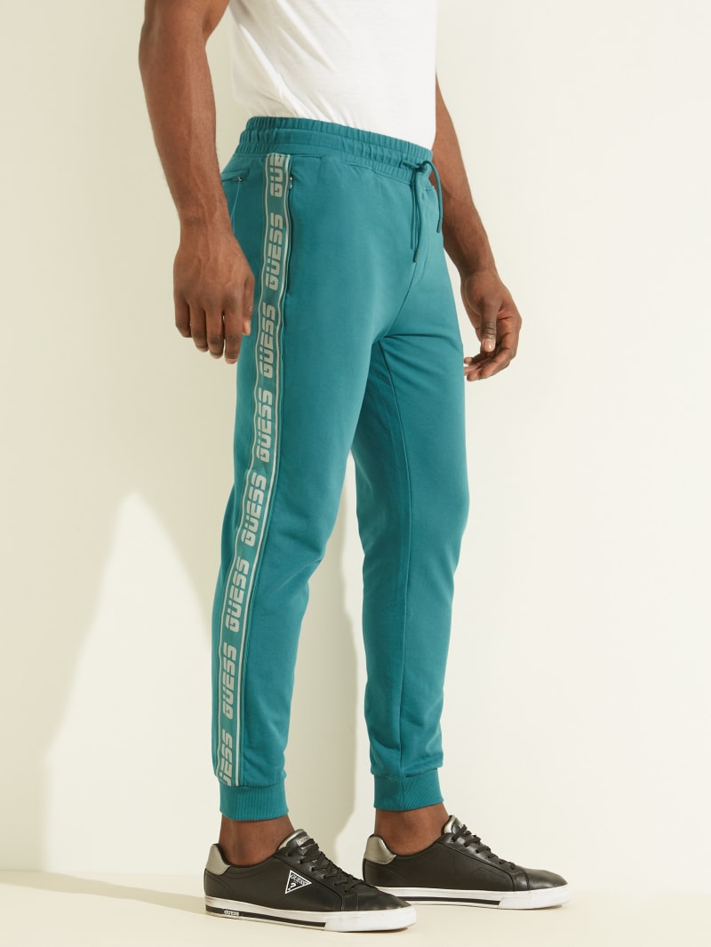 Turquoise Men's Guess Eco Arlo Logo Tape Joggers Pants | 6287351-CD